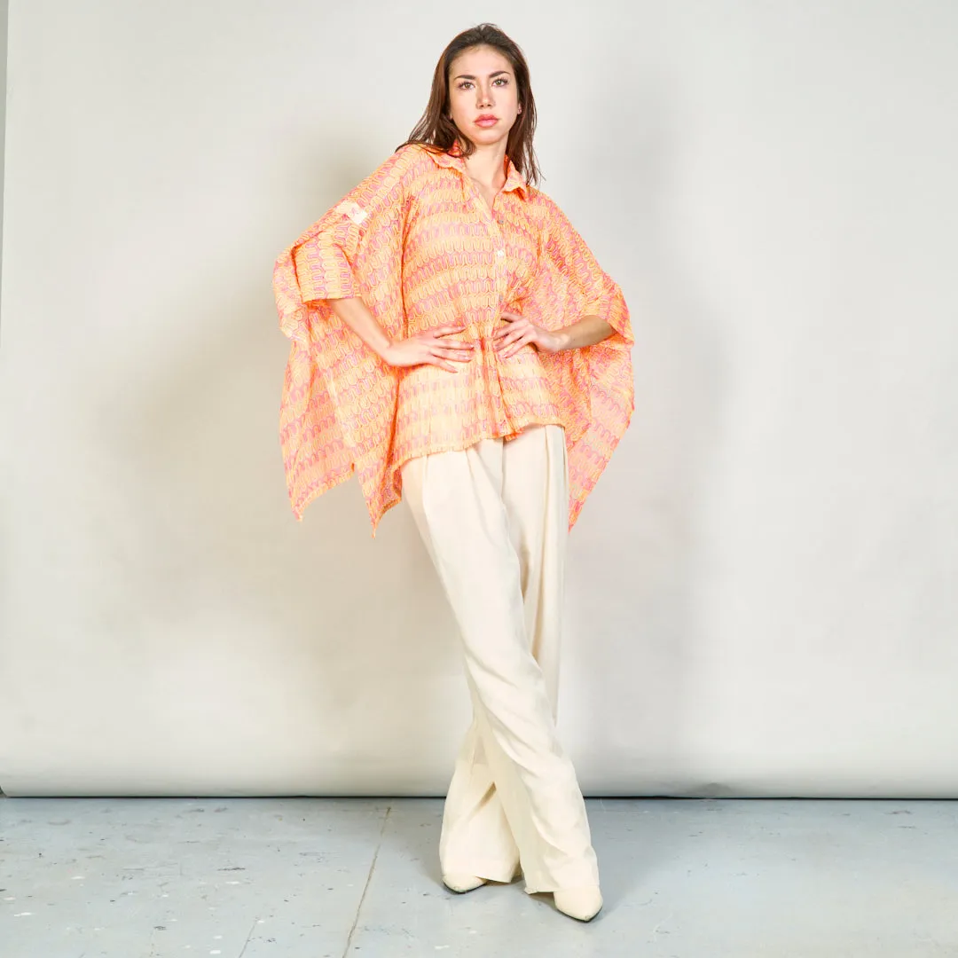 Sheer abstract printed shirt with asymmetric hem wholesale